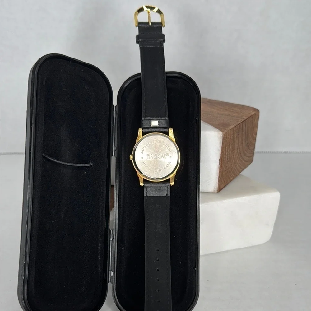 Vintage Affirmed Black and Gold Watch with Horse Design lot W2